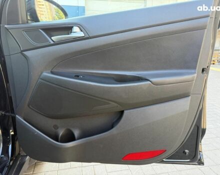 Черный Хендай Туксон, объемом двигателя 2 л и пробегом 54 тыс. км за 24490 $, фото 15 на Automoto.ua