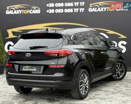 Черный Хендай Туксон, объемом двигателя 2 л и пробегом 55 тыс. км за 22300 $, фото 19 на Automoto.ua