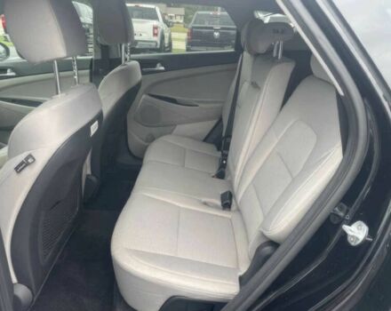 Черный Хендай Туксон, объемом двигателя 2 л и пробегом 38 тыс. км за 10400 $, фото 8 на Automoto.ua