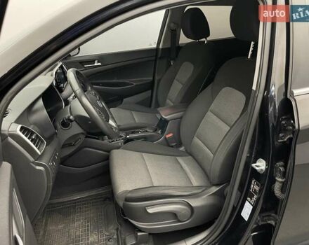 Черный Хендай Туксон, объемом двигателя 2 л и пробегом 100 тыс. км за 22424 $, фото 9 на Automoto.ua