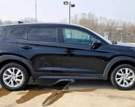 Черный Хендай Туксон, объемом двигателя 2 л и пробегом 76 тыс. км за 11200 $, фото 4 на Automoto.ua