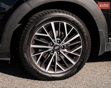 Черный Хендай Туксон, объемом двигателя 2 л и пробегом 88 тыс. км за 23000 $, фото 9 на Automoto.ua