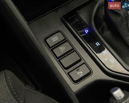 Черный Хендай Туксон, объемом двигателя 2 л и пробегом 100 тыс. км за 22424 $, фото 21 на Automoto.ua