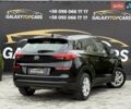 Черный Хендай Туксон, объемом двигателя 2 л и пробегом 77 тыс. км за 21500 $, фото 23 на Automoto.ua