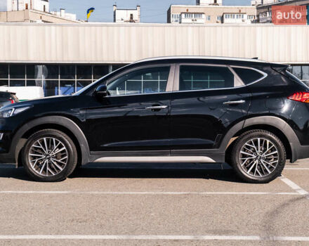 Черный Хендай Туксон, объемом двигателя 2 л и пробегом 88 тыс. км за 23000 $, фото 4 на Automoto.ua