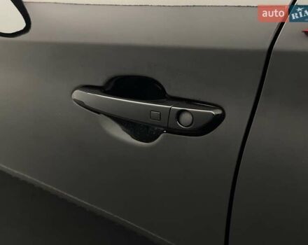 Черный Хендай Туксон, объемом двигателя 2 л и пробегом 100 тыс. км за 22424 $, фото 7 на Automoto.ua