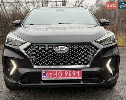 Черный Хендай Туксон, объемом двигателя 2 л и пробегом 98 тыс. км за 25900 $, фото 2 на Automoto.ua