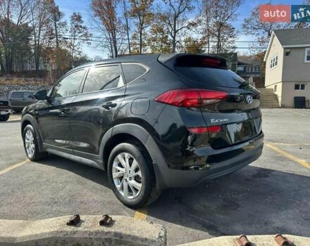 Черный Хендай Туксон, объемом двигателя 2 л и пробегом 125 тыс. км за 4300 $, фото 1 на Automoto.ua