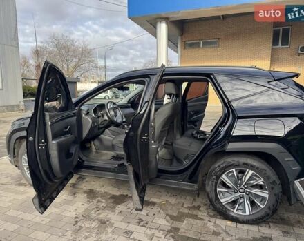 Черный Хендай Туксон, объемом двигателя 2 л и пробегом 126 тыс. км за 24000 $, фото 6 на Automoto.ua