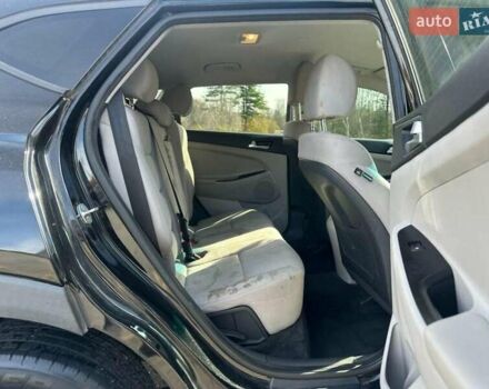 Черный Хендай Туксон, объемом двигателя 2 л и пробегом 125 тыс. км за 4300 $, фото 8 на Automoto.ua