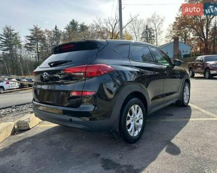 Черный Хендай Туксон, объемом двигателя 2 л и пробегом 125 тыс. км за 4300 $, фото 2 на Automoto.ua