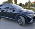 Черный Хендай Туксон, объемом двигателя 1.6 л и пробегом 69 тыс. км за 31300 $, фото 2 на Automoto.ua