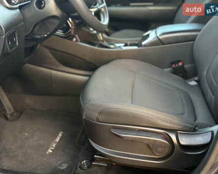 Черный Хендай Туксон, объемом двигателя 2.5 л и пробегом 74 тыс. км за 21500 $, фото 9 на Automoto.ua