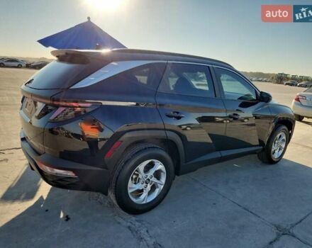 Черный Хендай Туксон, объемом двигателя 2.5 л и пробегом 122 тыс. км за 5700 $, фото 2 на Automoto.ua