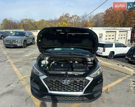 Черный Хендай Туксон, объемом двигателя 2 л и пробегом 125 тыс. км за 4300 $, фото 4 на Automoto.ua