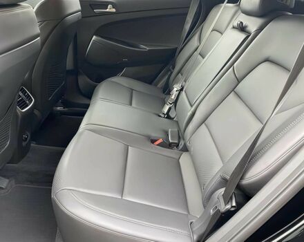 Черный Хендай Туксон, объемом двигателя 2.4 л и пробегом 21 тыс. км за 12600 $, фото 12 на Automoto.ua