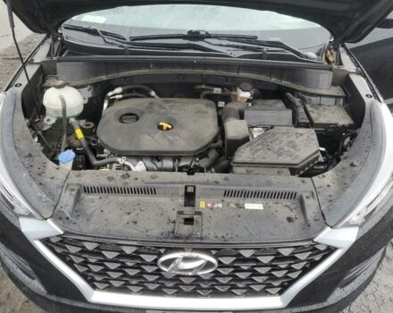 Черный Хендай Туксон, объемом двигателя 2 л и пробегом 47 тыс. км за 18950 $, фото 11 на Automoto.ua