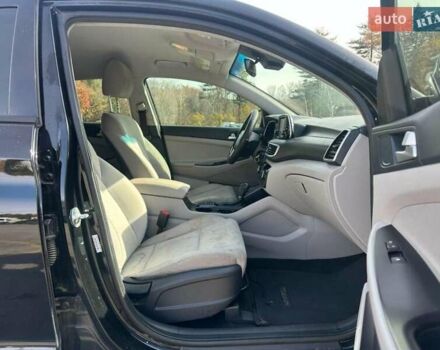 Черный Хендай Туксон, объемом двигателя 2 л и пробегом 125 тыс. км за 4300 $, фото 5 на Automoto.ua