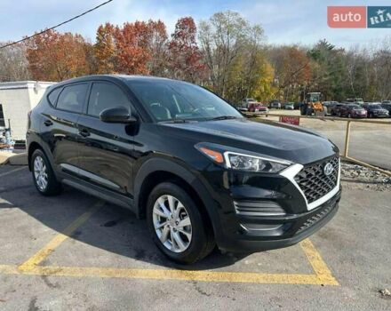 Черный Хендай Туксон, объемом двигателя 2 л и пробегом 125 тыс. км за 4300 $, фото 3 на Automoto.ua