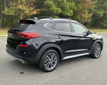 Черный Хендай Туксон, объемом двигателя 2.4 л и пробегом 21 тыс. км за 12600 $, фото 3 на Automoto.ua