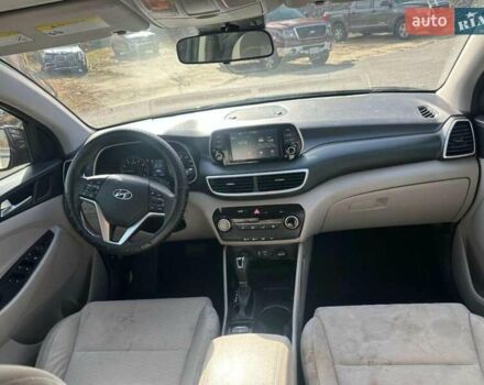Черный Хендай Туксон, объемом двигателя 2 л и пробегом 125 тыс. км за 4300 $, фото 6 на Automoto.ua