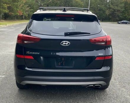 Черный Хендай Туксон, объемом двигателя 2.4 л и пробегом 21 тыс. км за 12600 $, фото 4 на Automoto.ua