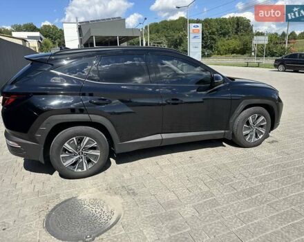 Чорний Хендай Туксон, об'ємом двигуна 2 л та пробігом 124 тис. км за 23000 $, фото 2 на Automoto.ua