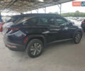 Черный Хендай Туксон, объемом двигателя 1.6 л и пробегом 204 тыс. км за 8100 $, фото 4 на Automoto.ua