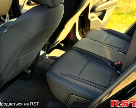 Черный Хендай Туксон, объемом двигателя 2.5 л и пробегом 115 тыс. км за 24999 $, фото 10 на Automoto.ua