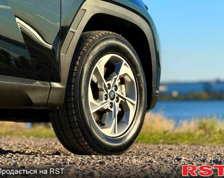 Черный Хендай Туксон, объемом двигателя 2.5 л и пробегом 115 тыс. км за 24999 $, фото 5 на Automoto.ua