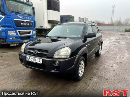 Черный Хендай Туксон, объемом двигателя 2 л и пробегом 205 тыс. км за 5600 $, фото 1 на Automoto.ua