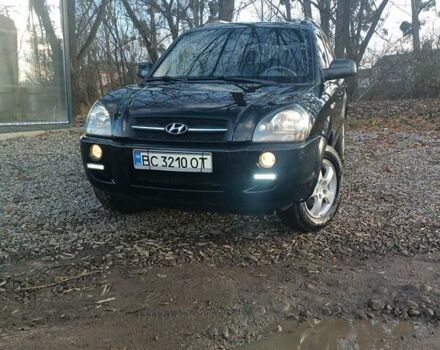 Черный Хендай Туксон, объемом двигателя 2 л и пробегом 236 тыс. км за 6000 $, фото 1 на Automoto.ua