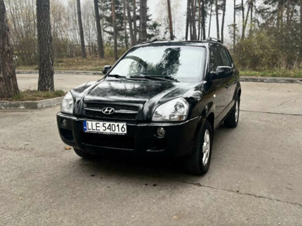 Черный Хендай Туксон, объемом двигателя 2 л и пробегом 280 тыс. км за 3250 $, фото 1 на Automoto.ua