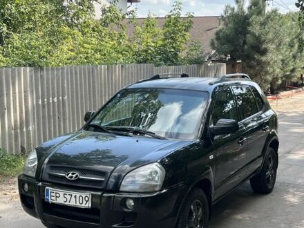 Черный Хендай Туксон, объемом двигателя 2 л и пробегом 240 тыс. км за 4200 $, фото 1 на Automoto.ua