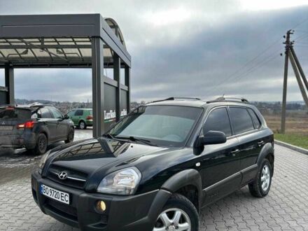 Черный Хендай Туксон, объемом двигателя 2 л и пробегом 180 тыс. км за 6450 $, фото 1 на Automoto.ua