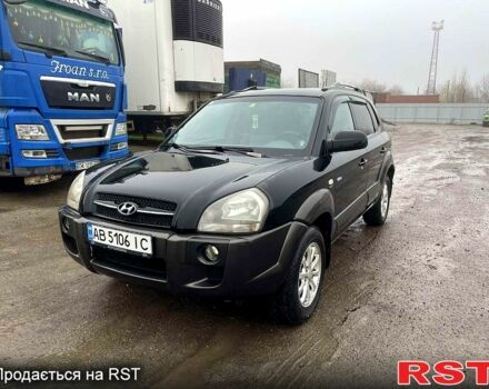 Черный Хендай Туксон, объемом двигателя 2 л и пробегом 205 тыс. км за 5600 $, фото 1 на Automoto.ua
