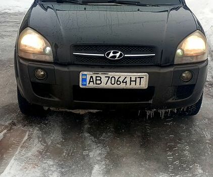 Черный Хендай Туксон, объемом двигателя 2 л и пробегом 250 тыс. км за 6666 $, фото 1 на Automoto.ua