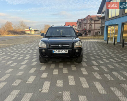 Черный Хендай Туксон, объемом двигателя 1.99 л и пробегом 245 тыс. км за 6700 $, фото 1 на Automoto.ua