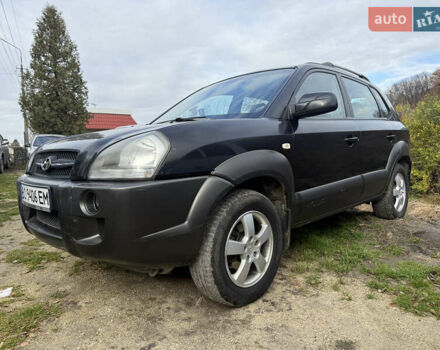 Чорний Хендай Туксон, об'ємом двигуна 2 л та пробігом 211 тис. км за 4444 $, фото 1 на Automoto.ua