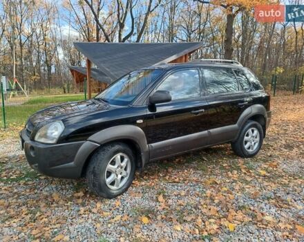 Хендай Туксон 2005 у Харкові на Automoto.ua Чорний Хендай Туксон, об'ємом двигуна 1.98 л та пробігом 192 тис. км за 7200 $, фото 1 на Automoto.ua