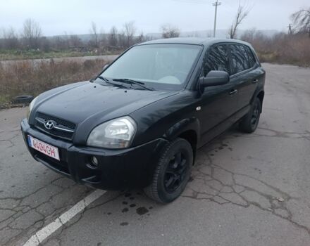 Черный Хендай Туксон, объемом двигателя 2 л и пробегом 293 тыс. км за 4300 $, фото 1 на Automoto.ua