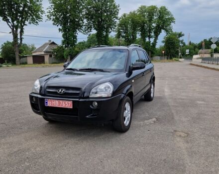 Черный Хендай Туксон, объемом двигателя 2 л и пробегом 252 тыс. км за 6750 $, фото 1 на Automoto.ua
