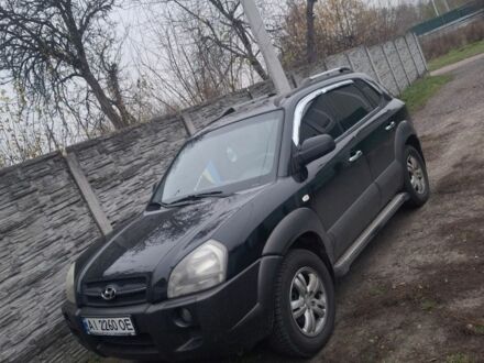 Черный Хендай Туксон, объемом двигателя 2 л и пробегом 224 тыс. км за 6800 $, фото 1 на Automoto.ua