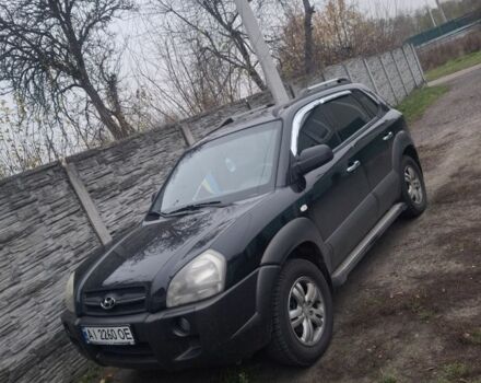 Черный Хендай Туксон, объемом двигателя 2 л и пробегом 224 тыс. км за 6800 $, фото 1 на Automoto.ua