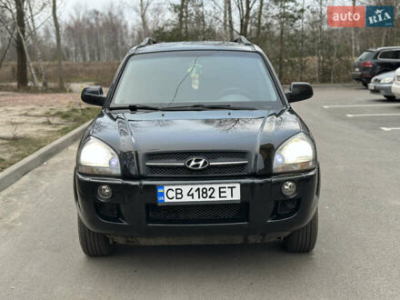 Черный Хендай Туксон, объемом двигателя 1.98 л и пробегом 171 тыс. км за 6700 $, фото 1 на Automoto.ua