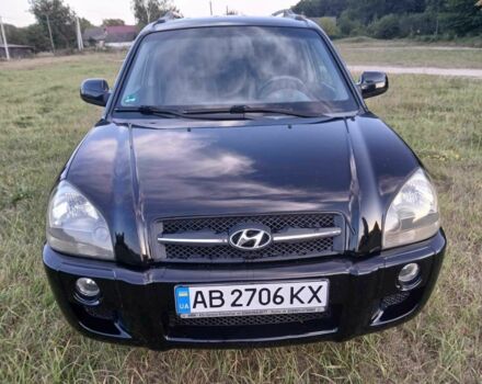 Черный Хендай Туксон, объемом двигателя 2 л и пробегом 160 тыс. км за 6150 $, фото 1 на Automoto.ua
