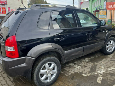 Черный Хендай Туксон, объемом двигателя 2 л и пробегом 217 тыс. км за 7552 $, фото 1 на Automoto.ua