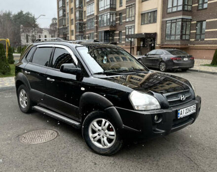 Черный Хендай Туксон, объемом двигателя 1.98 л и пробегом 225 тыс. км за 6600 $, фото 1 на Automoto.ua