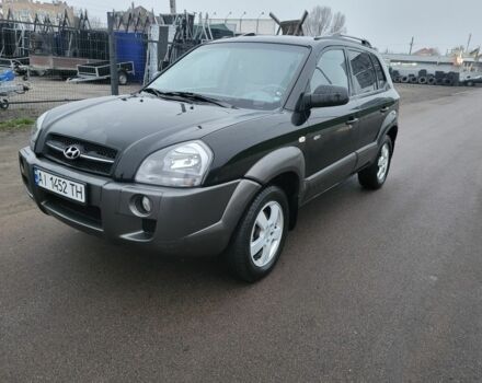 Черный Хендай Туксон, объемом двигателя 2 л и пробегом 180 тыс. км за 4500 $, фото 1 на Automoto.ua