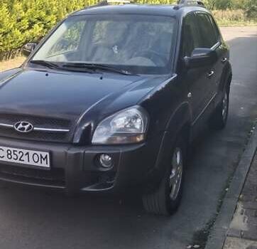 Чорний Хендай Туксон, об'ємом двигуна 1.99 л та пробігом 254 тис. км за 7800 $, фото 1 на Automoto.ua